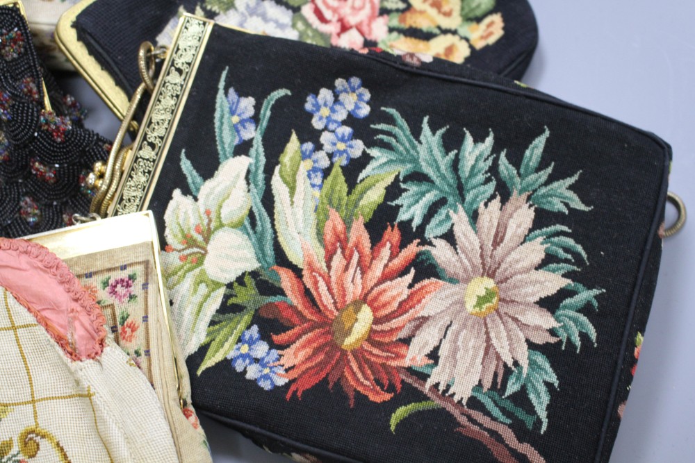 A collection of assorted vintage bags and evening purses